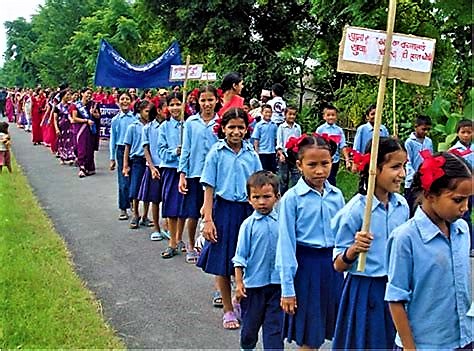 Children and women participating in a sanitation promotion rally in Nepal. Source: ADHIKARI & SHRESTHRA (n.y.)