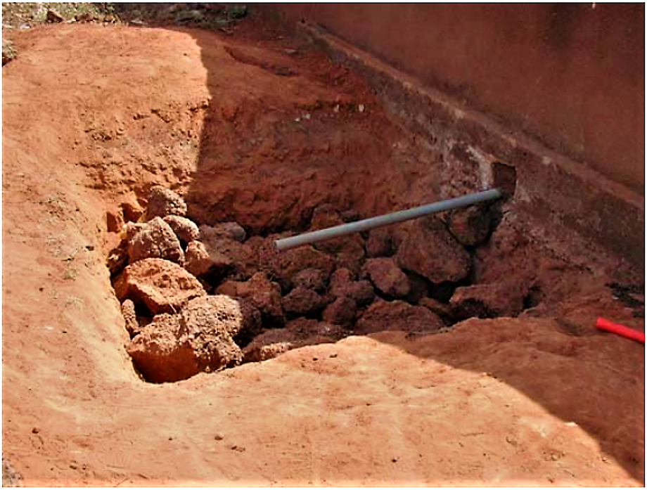 Open Soak pit with installed PVC pipe in Quayerma, Mali. Source: AHRENS (2005)