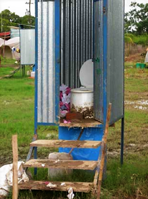 Urine diverting toilet in Bolivia, displaying the toilet paper management problem described in the example. Source: OXFAM (2009)