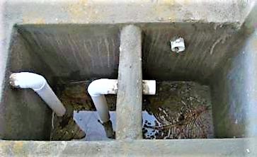A grease trap (under construction) for the kitchen of a school in Oaxaca, Mexico. It is easy to construct, but maintenance and accessibility must be guaranteed. Source: STAUFFER (2010)