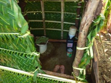 Low-cost Arborloo with separate collection of urine in EcoPees (urinal made out of recycled plastic containers). Designed and constructed by WAND Foundation (www.wandphils.org). Source: SuSanA (2009)
